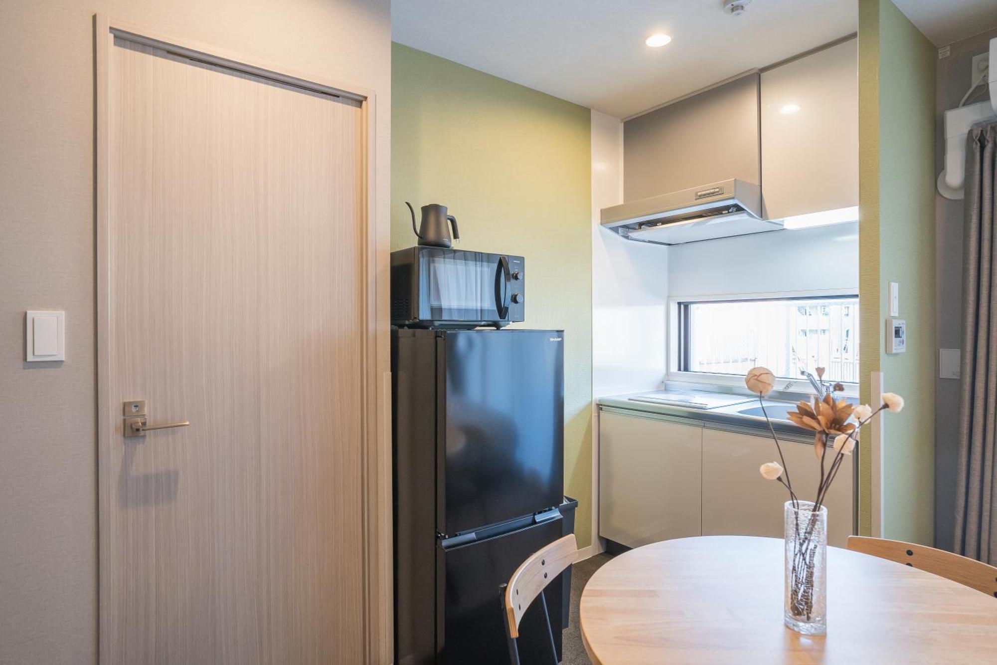 Apartment Hotel 11 Umeda Kamiyama Осака Стая снимка